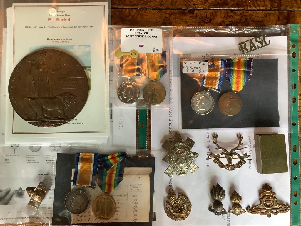 A group of assorted WW1 medals and badges etc